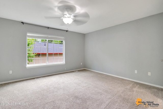 17480 Beaujolais Cir, Eagle River, AK 99577 - carpeted empty room with ceiling fan and baseboards