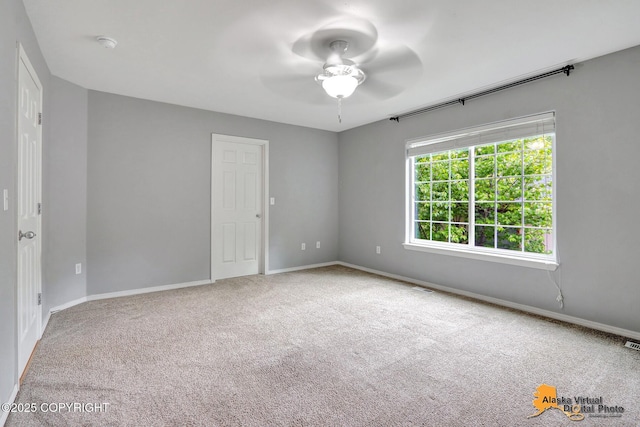 17480 Beaujolais Cir, Eagle River, AK 99577 - unfurnished room with ceiling fan, carpet floors, baseboards, and a smoke detector