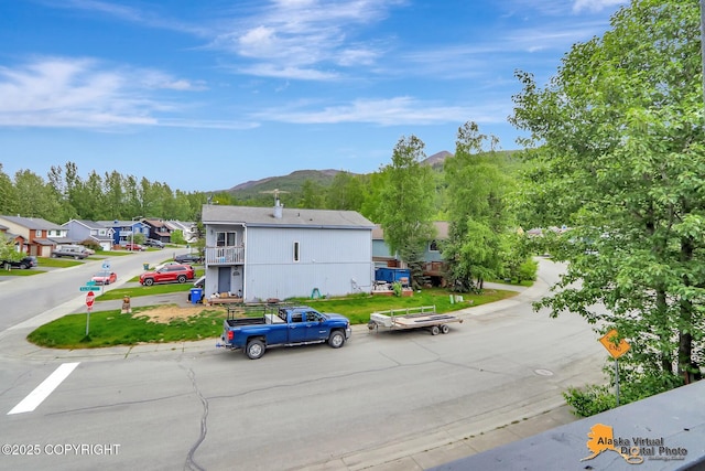 17480 Beaujolais Cir, Eagle River, AK 99577 - view of front of property featuring a mountain view and a residential view