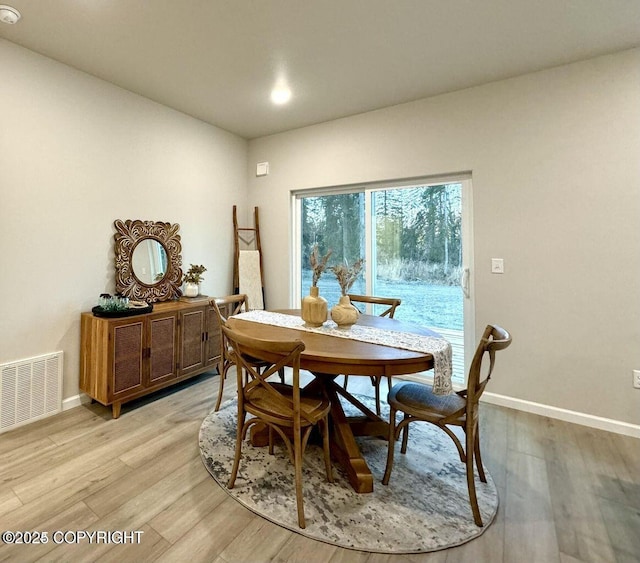 680 Wortham Ave, Kenai, AK 99611 - dining area with baseboards and light wood-style flooring