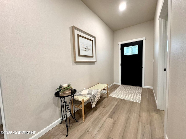 680 Wortham Ave, Kenai, AK 99611 - entryway featuring light wood-style floors and baseboards