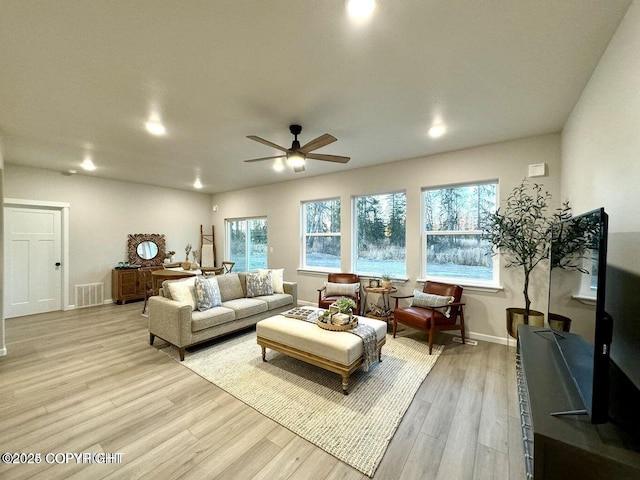 680 Wortham Ave, Kenai, AK 99611 - living room with a ceiling fan, light wood-style flooring, recessed lighting, and baseboards