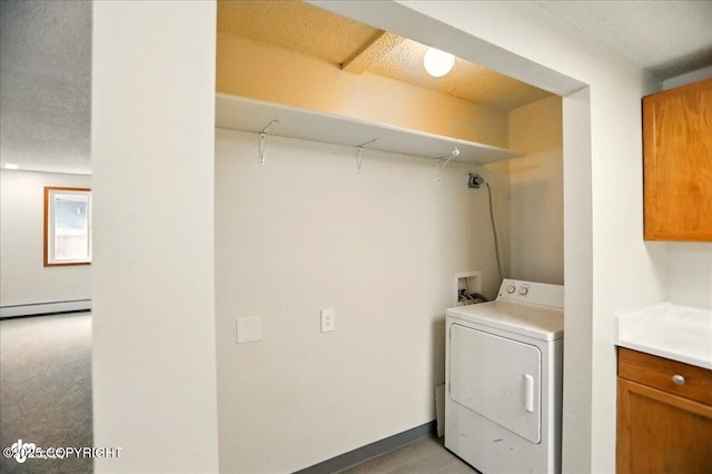 3962 Reka Dr # C1, Anchorage, AK 99508 - laundry area with washer / clothes dryer, a baseboard radiator, and cabinet space