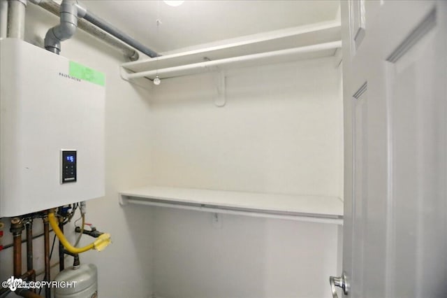 3962 Reka Dr # C1, Anchorage, AK 99508 - walk in closet with tankless water heater