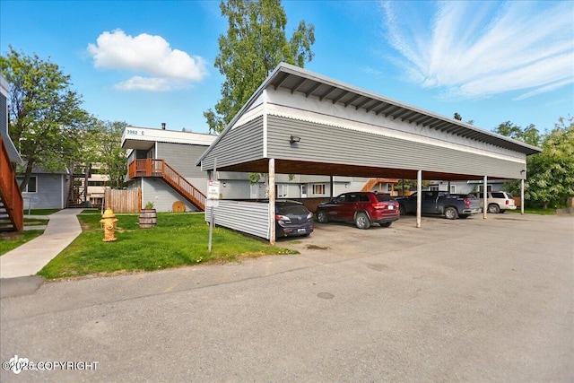 3962 Reka Dr # C1, Anchorage, AK 99508 - covered parking lot with stairway
