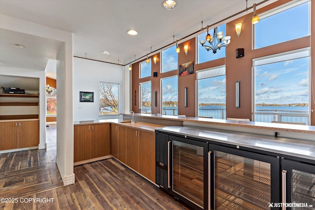5322 S Big Lake Rd, Big Lake, AK 99652 - bar featuring recessed lighting, a chandelier, and dark wood finished floors