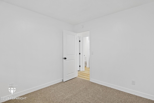 10108 Thimble Berry Dr, Anchorage, AK 99515 - spare room with carpet and baseboards