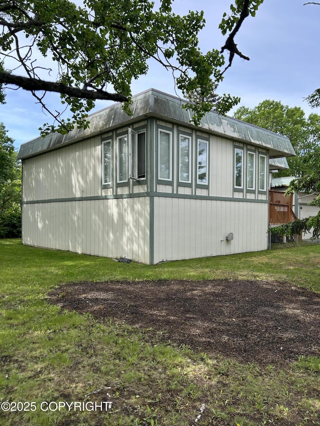 4148 W 88th Ave, Anchorage, AK 99502 - view of side of property featuring a yard