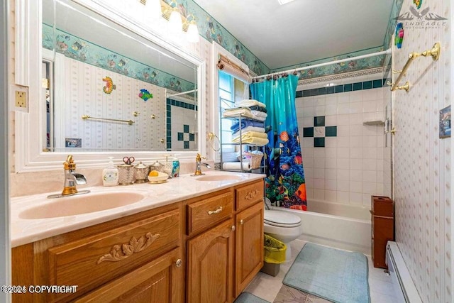 5411 Honeysuckle Ln, Wasilla, AK 99654 - full bathroom with a baseboard radiator, wallpapered walls, toilet, double vanity, and shower / bath combination with curtain