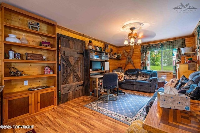 5411 Honeysuckle Ln, Wasilla, AK 99654 - office area with wood finished floors, wooden walls, and crown molding