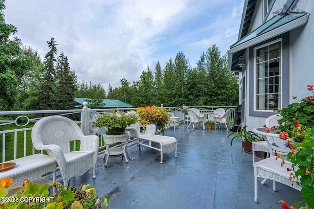 5411 Honeysuckle Ln, Wasilla, AK 99654 - view of patio / terrace with outdoor dining area