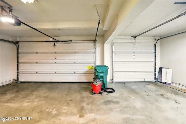 22030 Birch Creek Dr, Chugiak, AK 99567 - garage featuring a garage door opener