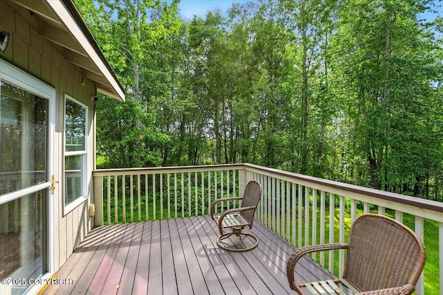 22030 Birch Creek Dr, Chugiak, AK 99567 - wooden terrace featuring view of wooded area