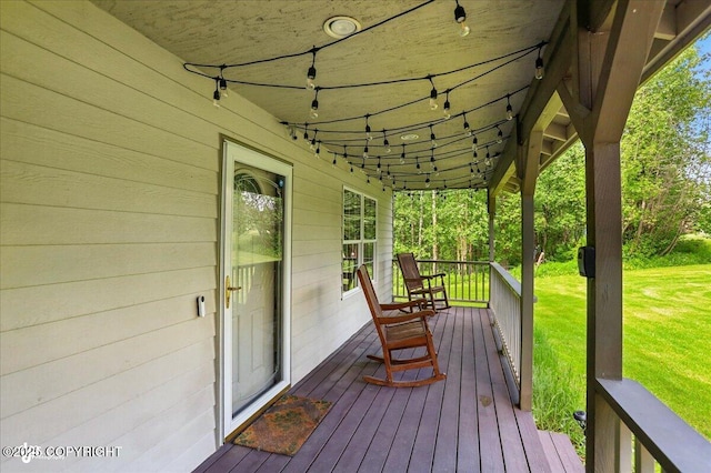22030 Birch Creek Dr, Chugiak, AK 99567 - wooden porch with a yard