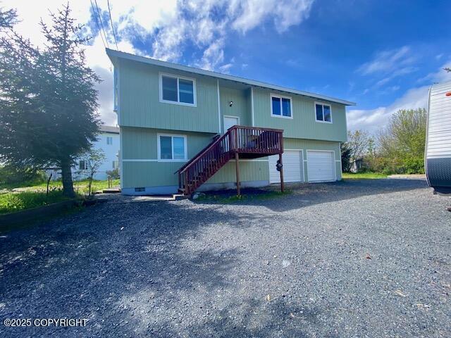 301 Teal Way, Kodiak, AK 99615 - split foyer home with stairs, a garage, and driveway
