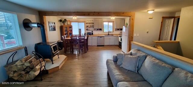 301 Teal Way, Kodiak, AK 99615 - living area with a wood stove and wood finished floors