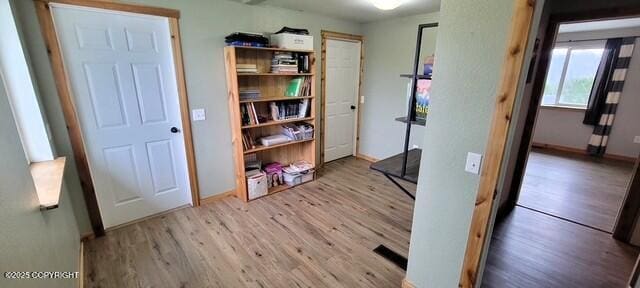 301 Teal Way, Kodiak, AK 99615 - hallway with wood finished floors and baseboards