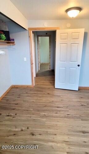 301 Teal Way, Kodiak, AK 99615 - hall with wood finished floors and baseboards