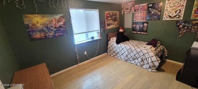 301 Teal Way, Kodiak, AK 99615 - bedroom featuring wood finished floors and baseboards