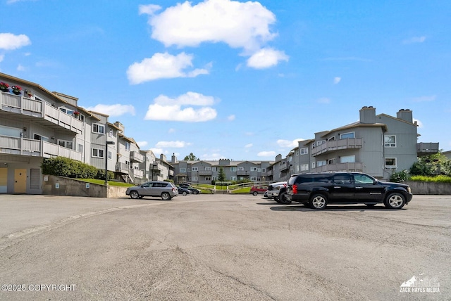 4109 Lynn Dr # 121, Anchorage, AK 99508 - view of asphalt road with a residential view