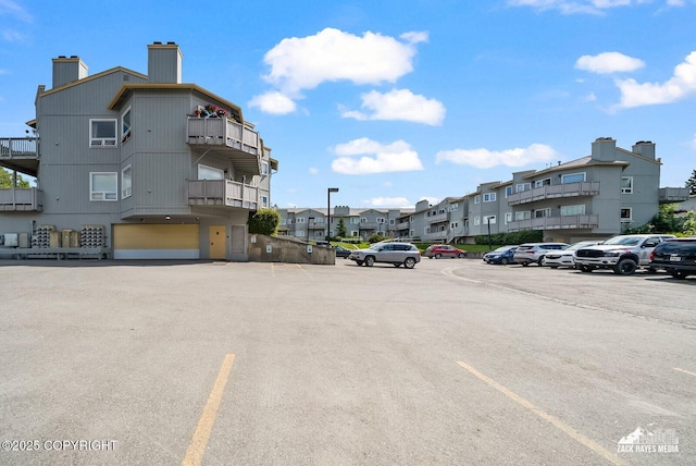 4109 Lynn Dr # 121, Anchorage, AK 99508 - view of asphalt road with a residential view
