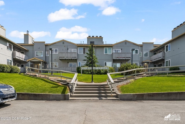 4109 Lynn Dr # 121, Anchorage, AK 99508 - view of property's community featuring a residential view and a yard