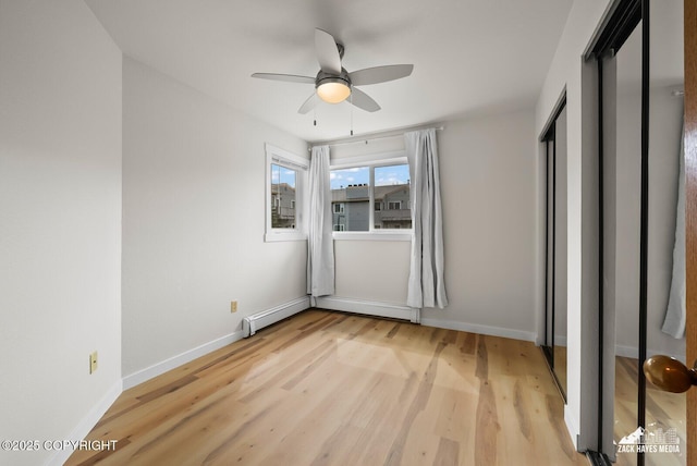 4109 Lynn Dr # 121, Anchorage, AK 99508 - unfurnished bedroom with light wood-type flooring and ceiling fan