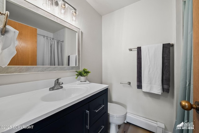 4109 Lynn Dr # 121, Anchorage, AK 99508 - full bathroom featuring baseboard heating and vanity
