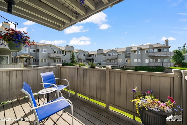 4109 Lynn Dr # 121, Anchorage, AK 99508 - wooden deck featuring a residential view