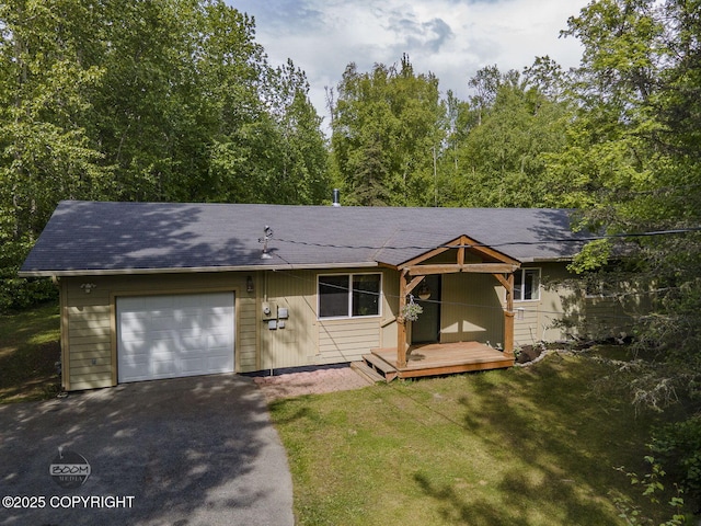 9845 E Lee Ann Dr, Palmer, AK 99645 - single story home with an attached garage, a front yard, asphalt driveway, and a wooden deck