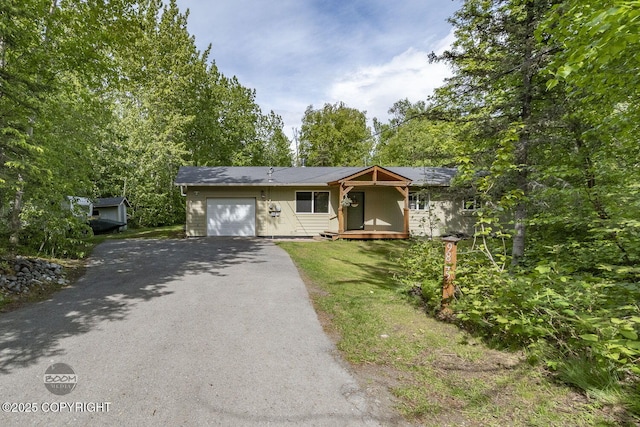 9845 E Lee Ann Dr, Palmer, AK 99645 - ranch-style house with an attached garage and driveway