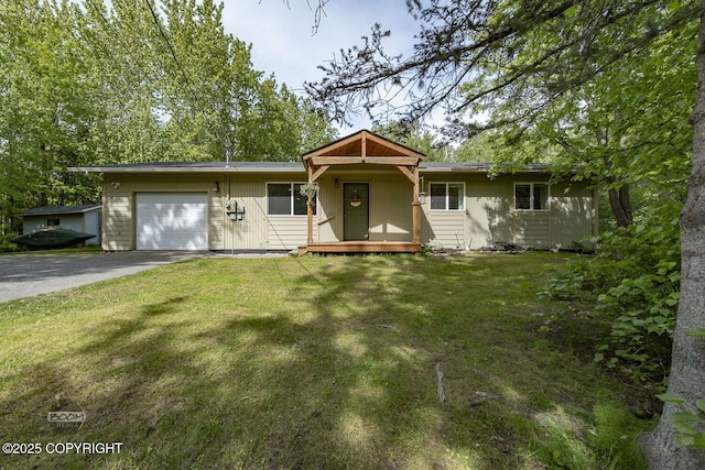 9845 E Lee Ann Dr, Palmer, AK 99645 - ranch-style house with an attached garage, driveway, and a front lawn