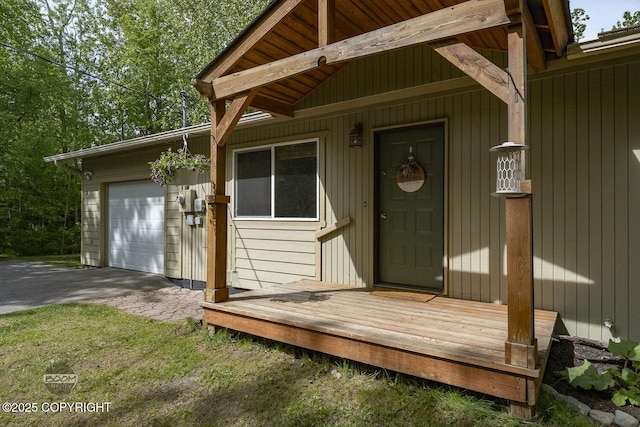 9845 E Lee Ann Dr, Palmer, AK 99645 - entrance to property featuring a garage and driveway