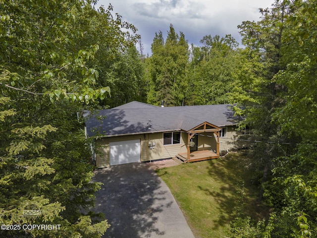 9845 E Lee Ann Dr, Palmer, AK 99645 - ranch-style home featuring driveway, a garage, and a wooden deck