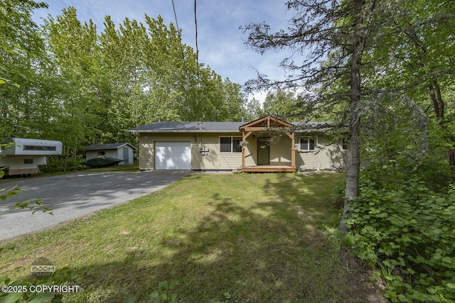 9845 E Lee Ann Dr, Palmer, AK 99645 - single story home featuring driveway, a garage, and a front lawn