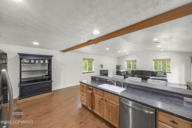 9845 E Lee Ann Dr, Palmer, AK 99645 - kitchen featuring dishwasher, a sink, dark countertops, dark wood finished floors, and a textured ceiling