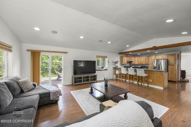 9845 E Lee Ann Dr, Palmer, AK 99645 - living area featuring lofted ceiling, healthy amount of natural light, recessed lighting, dark wood finished floors, and baseboards