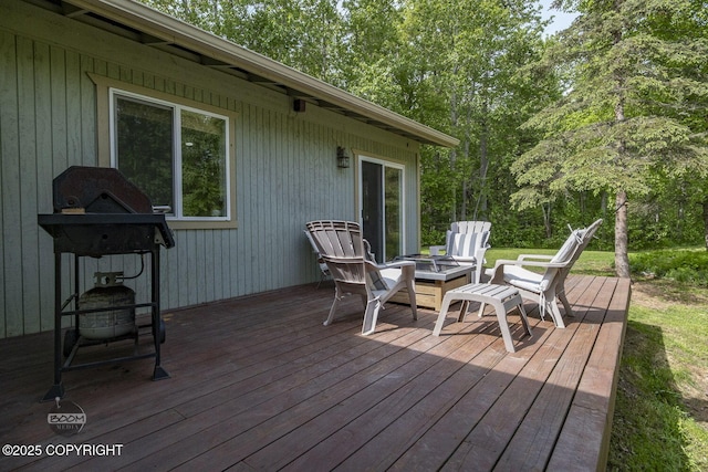 9845 E Lee Ann Dr, Palmer, AK 99645 - wooden terrace with an outdoor fire pit
