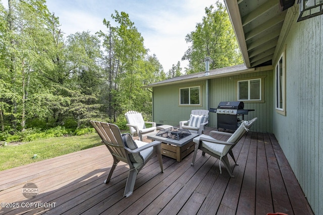 9845 E Lee Ann Dr, Palmer, AK 99645 - wooden terrace featuring a grill and a fire pit