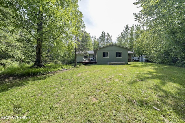 9845 E Lee Ann Dr, Palmer, AK 99645 - view of green lawn featuring a wooden deck