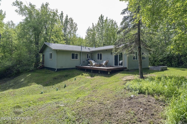 9845 E Lee Ann Dr, Palmer, AK 99645 - back of house featuring a deck and a yard