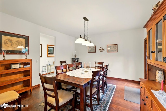34952 Treeline Ave, Soldotna, AK 99669 - dining area with dark wood-type flooring