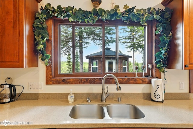 34952 Treeline Ave, Soldotna, AK 99669 - kitchen with light countertops and brown cabinets