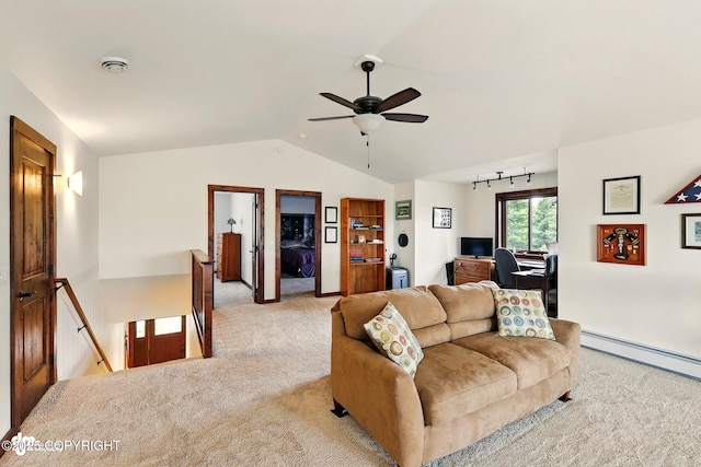 34952 Treeline Ave, Soldotna, AK 99669 - carpeted living area featuring lofted ceiling, an office area, a baseboard heating unit, and ceiling fan