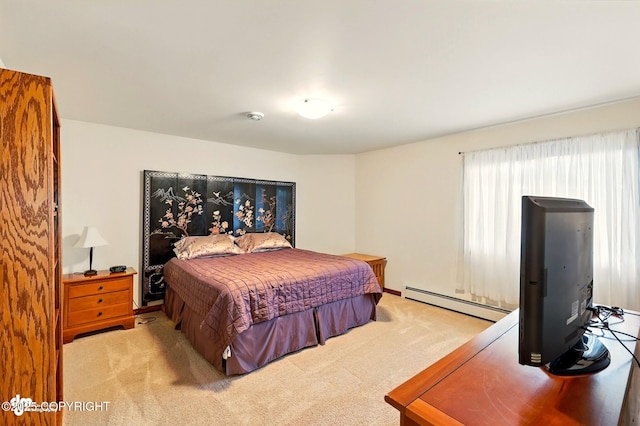 34952 Treeline Ave, Soldotna, AK 99669 - bedroom with a baseboard heating unit and carpet floors