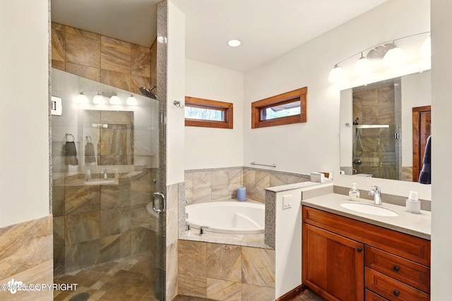 34952 Treeline Ave, Soldotna, AK 99669 - full bathroom featuring a garden tub, a stall shower, and vanity