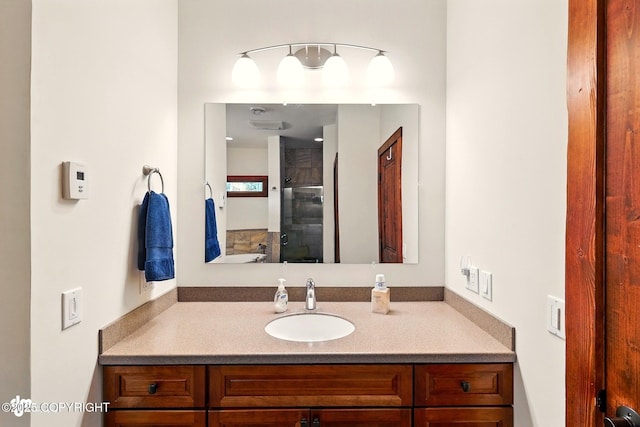 34952 Treeline Ave, Soldotna, AK 99669 - bathroom with vanity and a shower