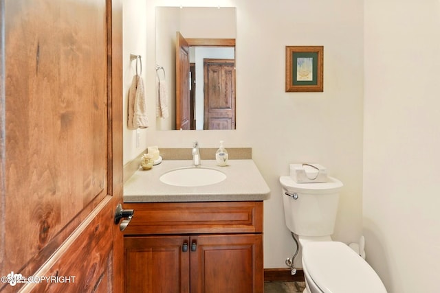 34952 Treeline Ave, Soldotna, AK 99669 - bathroom featuring vanity and toilet