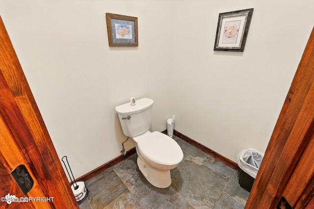 34952 Treeline Ave, Soldotna, AK 99669 - bathroom with toilet and baseboards