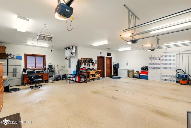 34952 Treeline Ave, Soldotna, AK 99669 - garage with a garage door opener and an office area